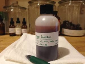 Picture of the finished herbal joint liniment, all bottled up.